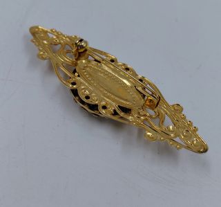 Tre spille bigiotteria dorate