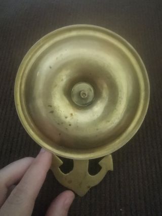 Candelabro antiguo con ancla