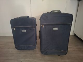 Maleta de viaje azul y gris