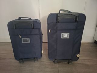 Maleta de viaje azul y gris