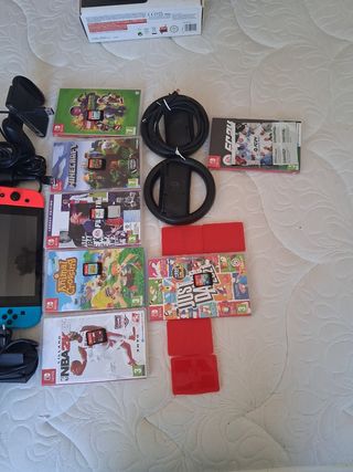 Nintendo Switch + Accesorios y Juegos +2 micrófono