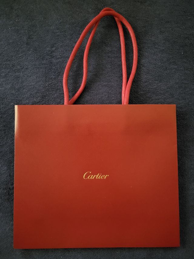 Bolsa Cartier de color rojo vibrante