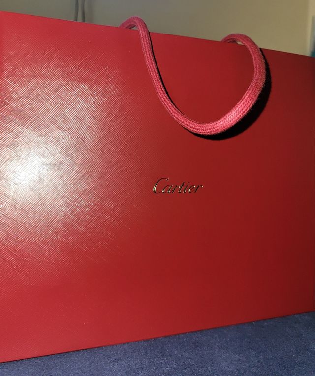 Bolsa Cartier de color rojo vibrante