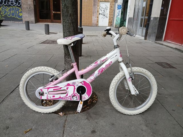 Bicicleta infantil rosa y blanca