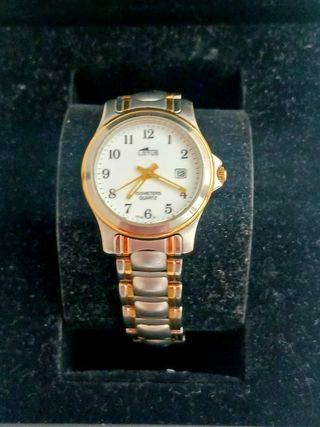 Reloj Lotus Dorado y Plateado