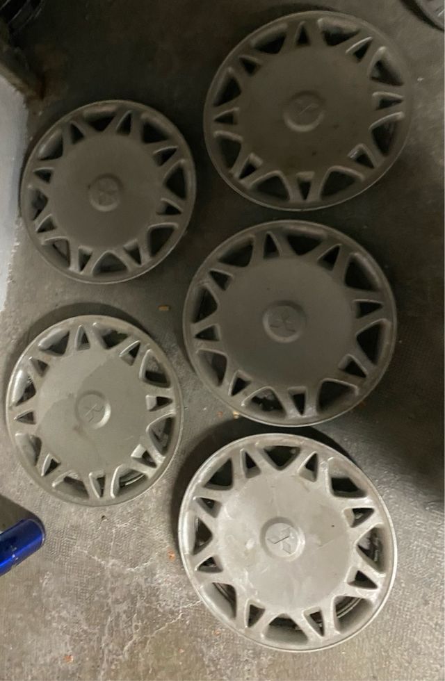 juego tapacubos originales Mitsubishi 14”