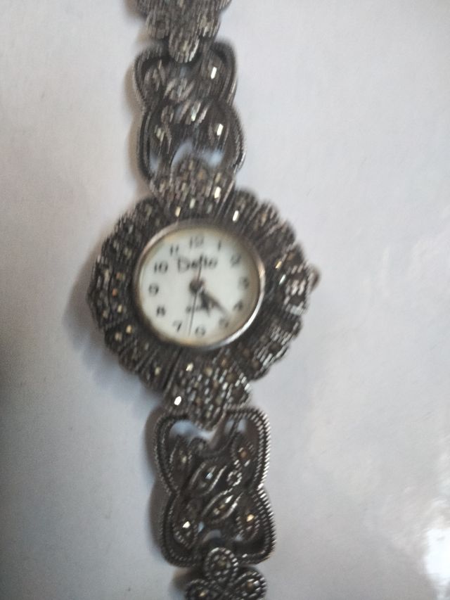 Reloj Delta Plata y Marquesitas