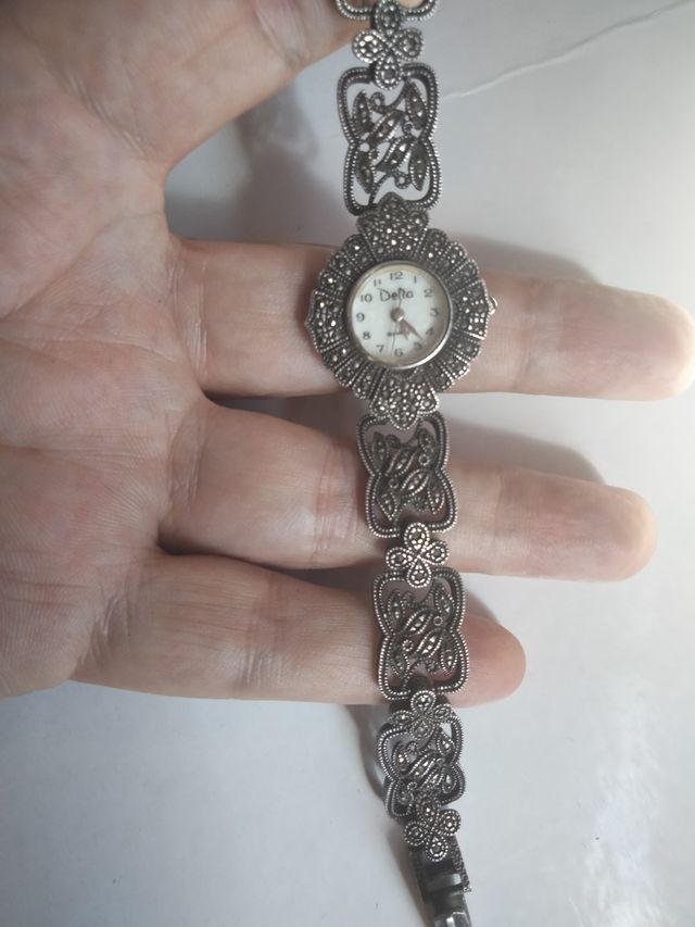 Reloj Delta Plata y Marquesitas
