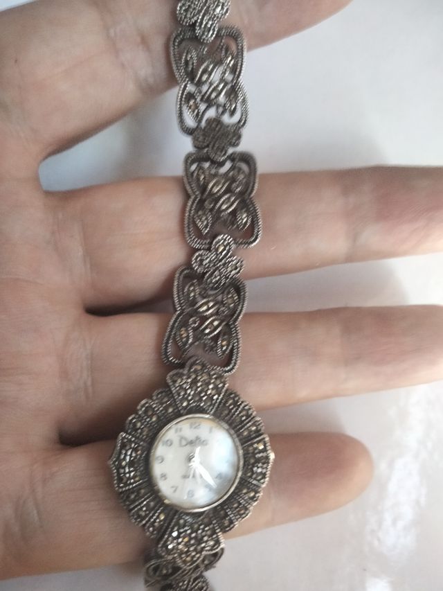 Reloj Delta Plata y Marquesitas