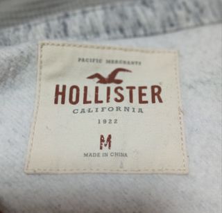 Chaqueta Hollister con capucha gris Talla M