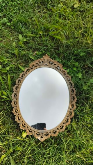 Specchio antico con cornice dorata
