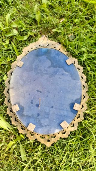 Specchio antico con cornice dorata