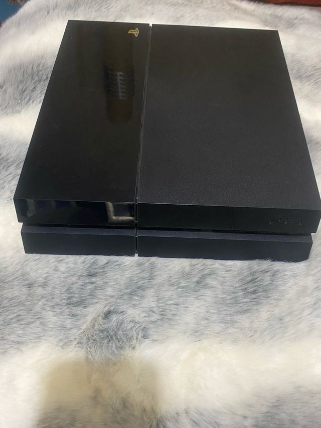 PS4 (PlayStation 4) con Mando y Juegos