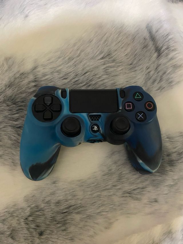 PS4 (PlayStation 4) con Mando y Juegos