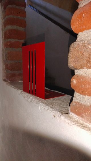 Fermalibri vintage in metallo rosso