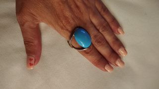 Anillo azul y plata
