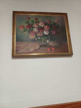 Cuadro de flores en marco dorado