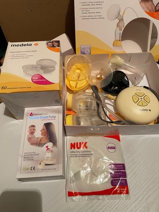 Sacaleches Medela Swing con accesorios extra
