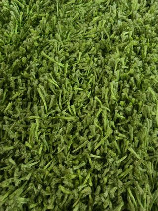 Alfombra verde mullida