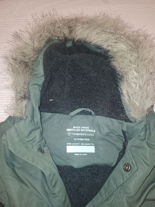 Anorak verde con capucha de pelo
