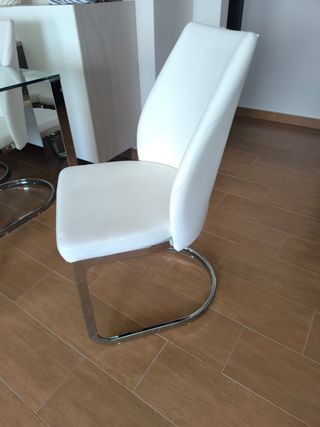 Mesa de comedor de cristal con 6 sillas