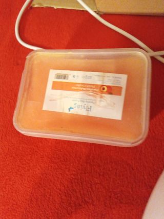 Aparato de parafina con guantes