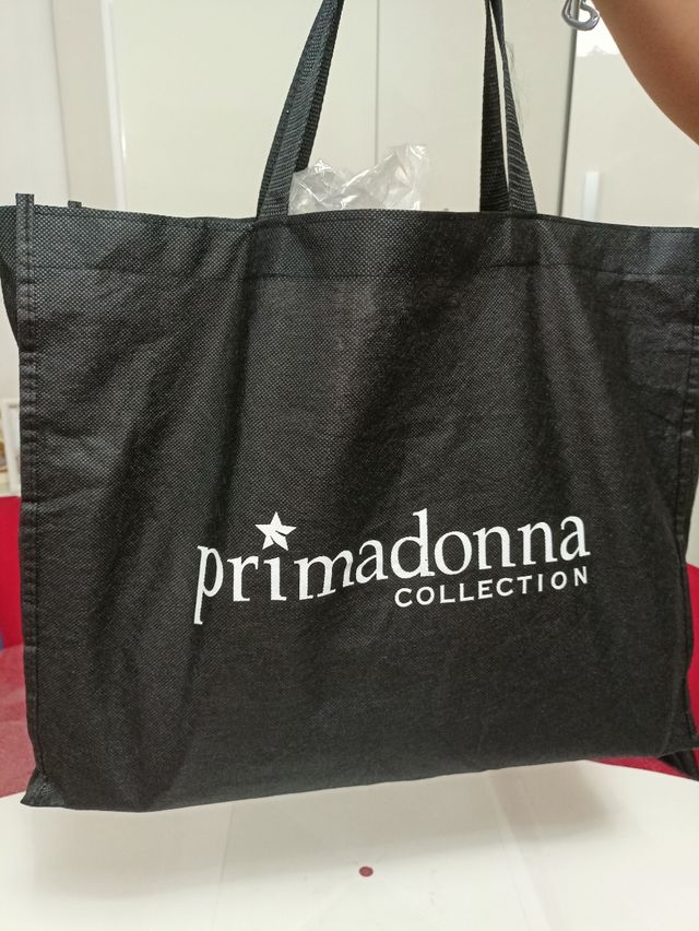 Borsa Primadonna rosa a mano con tracolla