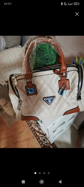 Bolso de mano y bandolera tela impermeable