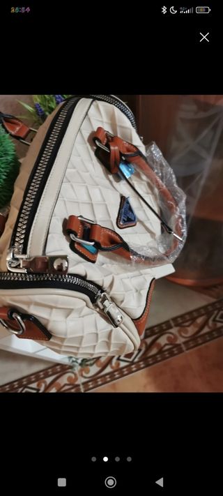 Bolso de mano y bandolera tela impermeable