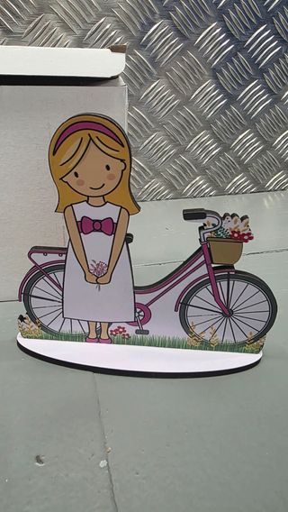 Adorno figura decorativa para tarta niña con bicic