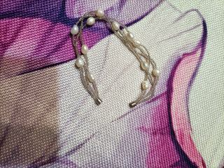 Bracciale perle e perline bianche