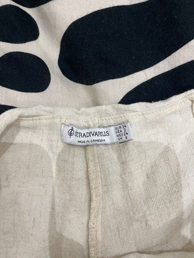 Falda mini beige con cordón y volantes