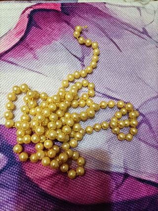 Filo di perle dorate/gialle