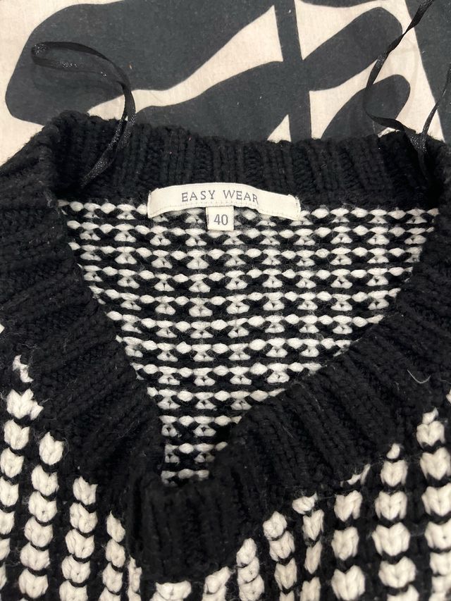 Jersey de punto blanco y negro