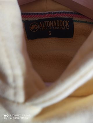 Sudadera amarilla con estampado de bicicleta