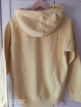 Sudadera amarilla con estampado de bicicleta