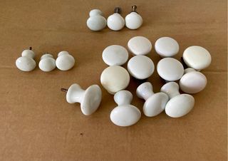 18 pomos porcelana blanca