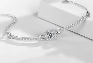 Conjunto Plata y Moissanita: Pulsera y Pendientes.