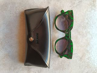 Occhiali da sole fantasia verde