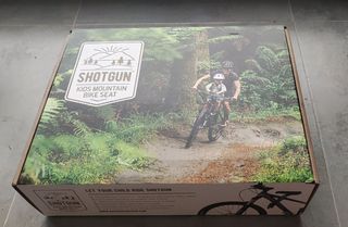 Asiento Shotgun para niños