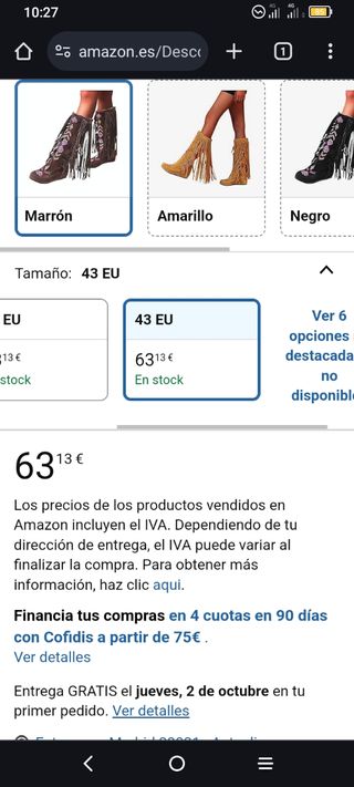Botas altas ante negras bordadas con flecos.