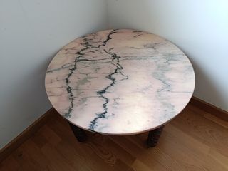 Mesa redonda de mármol