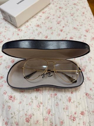 Gafas de sol Ray-Ban doradas y marrones