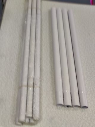 Perchero telescópico metálico y plástico