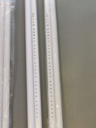 Perchero telescópico metálico y plástico