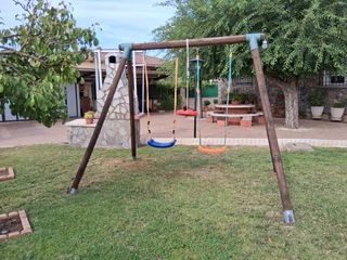Columpio de madera para jardín