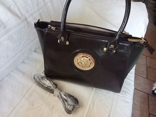 Bolso elegante marrón chocolate y dorado