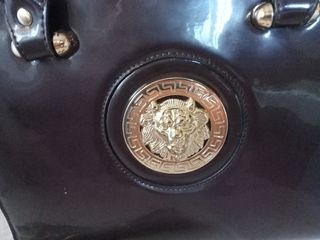 Bolso elegante marrón chocolate y dorado