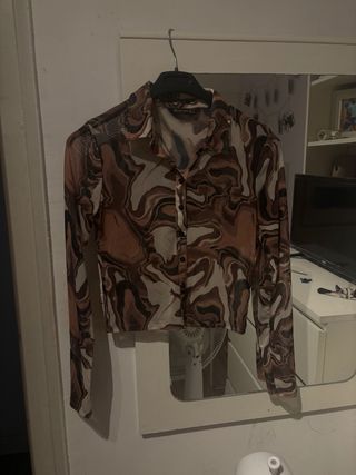 Blusa estampada manga larga