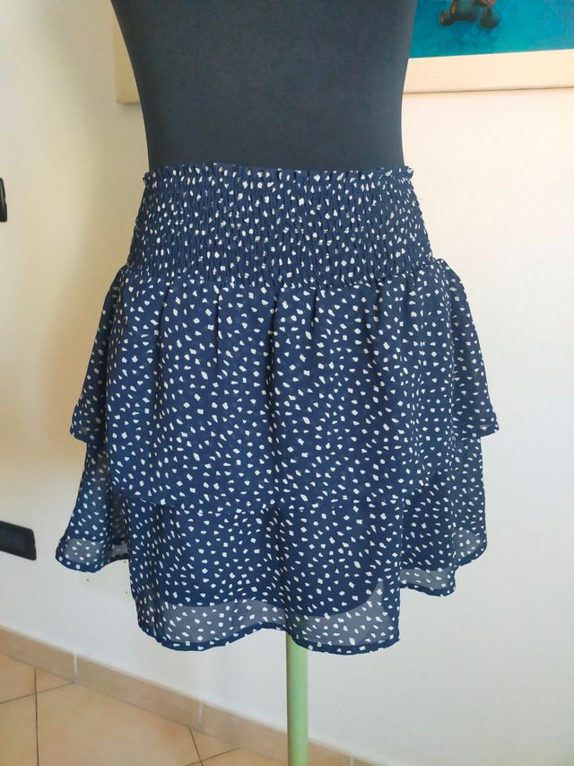 Gonna blu corta con fantasia